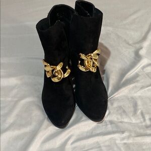 Elegant Black Ankle Boots with Gold Chain Accent